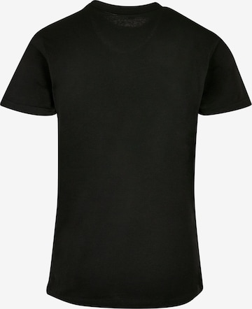 T-Shirt 'Let It Snow' Merchcode en noir