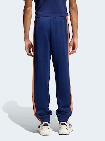 ADIDAS SPORTSWEAR Tapered Παντελόνι φόρμας 'Stadium' σε μπλε