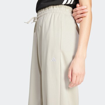ADIDAS SPORTSWEAR - Tapered Pantalón deportivo 'Essentials' en beige