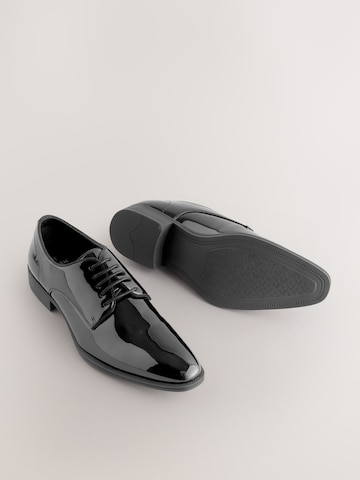 Chaussure à lacets Next en noir
