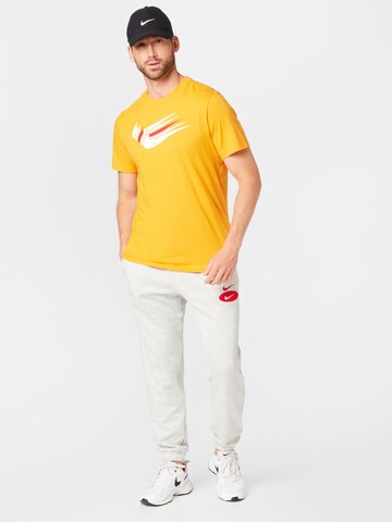 Effilé Pantalon Nike Sportswear en gris