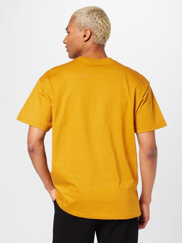 Tricou 'Chase' de la Carhartt WIP pe galben