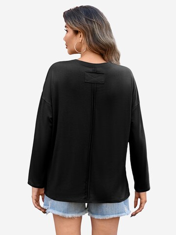 Tricou de la Imily Bela pe negru: spate