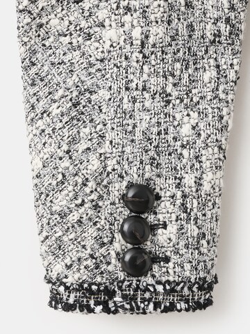 MANGO Välikausitakki 'Ditor' värissä musta