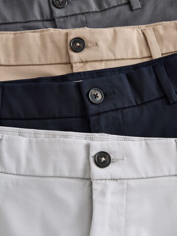 Next Slim fit Chino trousers in Beige