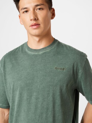 OAKLEY - Camiseta funcional en verde