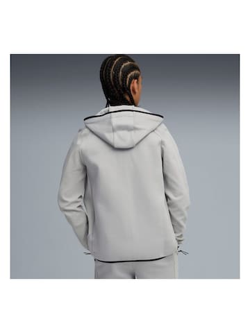 PUMA Sweatjacke 'Puma Evostripe Fz Hoodie Dk'‌‌‌‌ in Grau