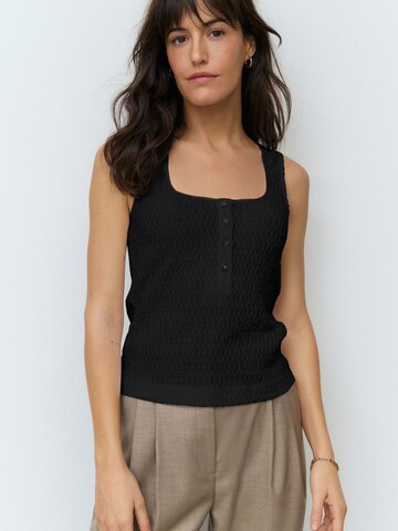 Next Top in Black: front