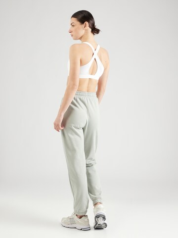 Athlecia Tapered Sportbroek 'Ruthie' in Groen