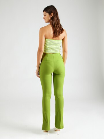 ABOUT YOU x Laura Giurcanu Flared Pants 'Joelle' in Green