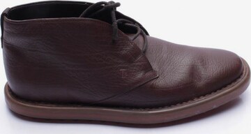 Tod's Flats & Loafers in 44 in Brown: front