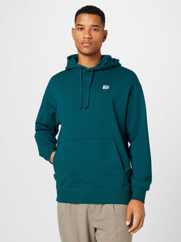 PUMA Athletic Sweatshirt in Green: front