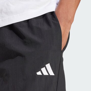 ADIDAS SPORTSWEAR Свободный крой Спортивные штаны 'Essential' в Черный