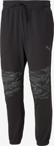 PUMA Tapered Sports trousers in Black: front