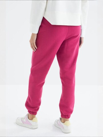Tommy Life Regular Sporthose 'Jogginghose'‌‌‌‌‌‌‌ in Pink