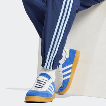 ADIDAS ORIGINALS Tapered Nadrág 'Adicolor Firebird' - kék