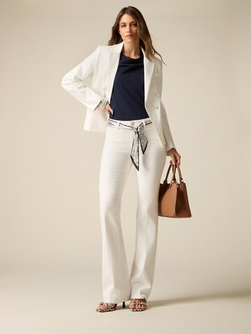 oltre Flared Pants in White: front