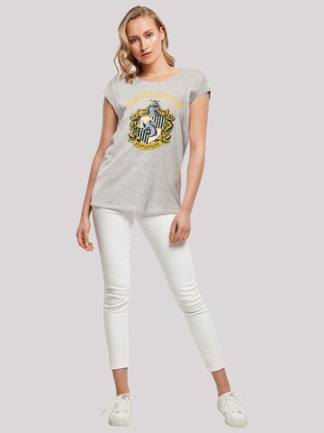 F4NT4STIC T-Shirt 'Harry Potter Hufflepuff Crest' in Grau