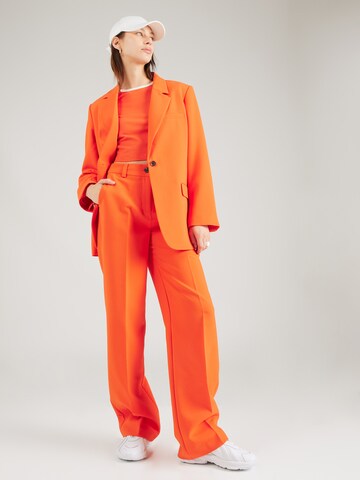 modström Lużny krój Spodnie w kant 'Gale' w kolorze pomarańczowy