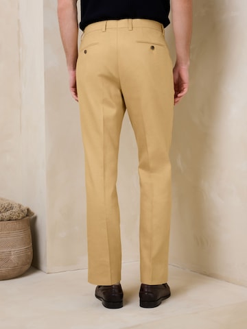 Next - regular Pantalón de pinzas 'N. Premium' en amarillo