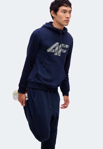 Tapered Pantaloni sport de la 4F pe albastru: lateral