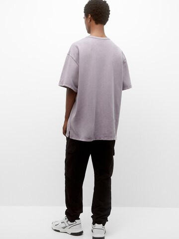 Pull&Bear Tapered Cargobroek in Zwart