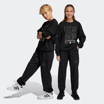 ADIDAS SPORTSWEAR Tapered Sportbroek 'Future Icons' in Zwart: voorkant