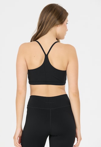 Athlecia Low Support Sport-BH 'Blossom' in Braun