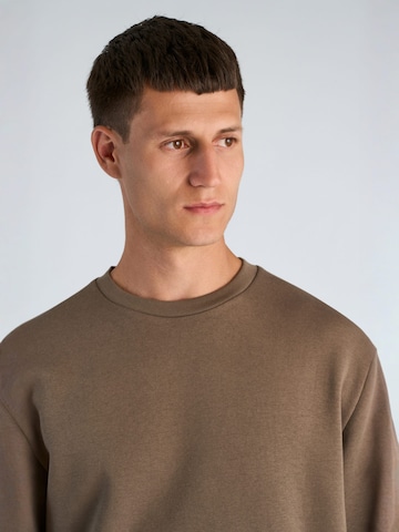 Junk de Luxe Sweatshirt in Brown