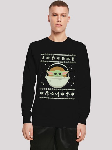 F4NT4STIC Sweatshirt 'Star Wars The Mandalorian Baby Yoda Christmas' in Zwart: voorkant