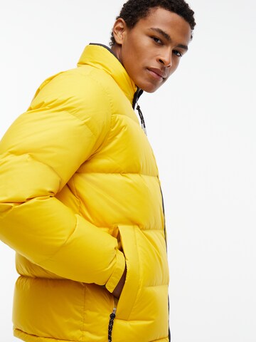 Giacca invernale di TOMMY HILFIGER in giallo