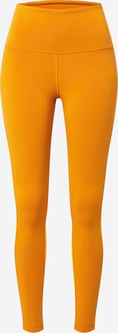 Reebok Sport Workout Pants in Orange: front