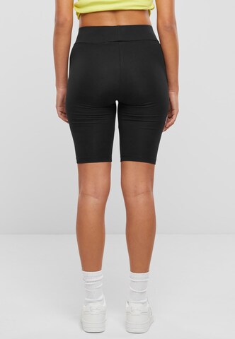 Karl Kani Skinny Sportbroek 'Essential' in Zwart