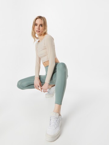 Skinny Pantalon de sport Reebok en vert