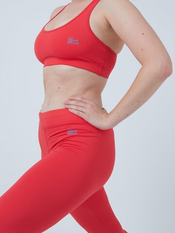 SPORTKIND Skinny Leggings '3/4 Leggings'‌‌‌‌‌ in Orange