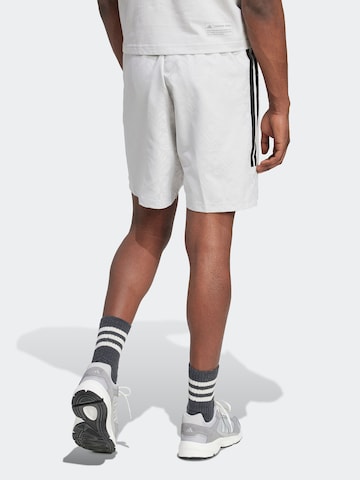 regular Pantaloni sportivi 'TIRO' di ADIDAS SPORTSWEAR in grigio