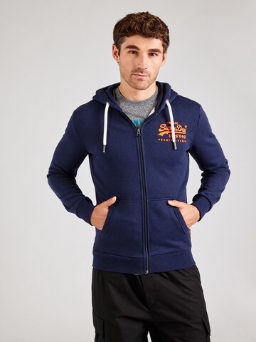 Veste de survêtement Superdry en bleu : devant