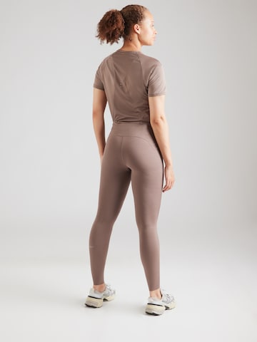 Skinny Pantalon de sport NIKE en marron