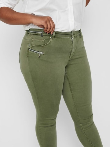 Skinny Jeans di ONLY Carmakoma in verde