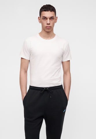 juoda Nike Sportswear Siaurėjantis Kelnės 'CLUB'