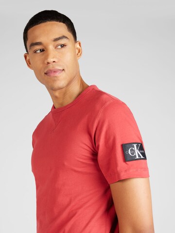 Tricou de la Calvin Klein Jeans pe roșu