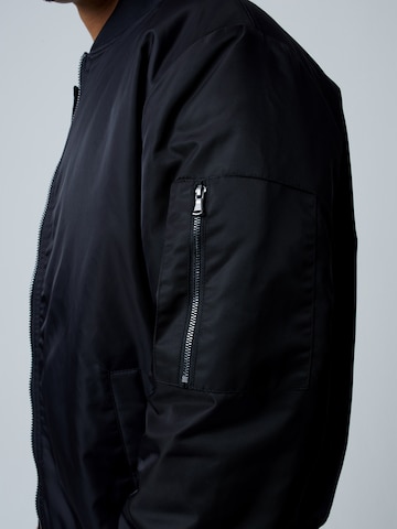 ABOUT YOU x Benny Cristo Between-Season Jacket 'Christos' in Black