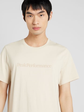 PEAK PERFORMANCE Functioneel shirt in Beige