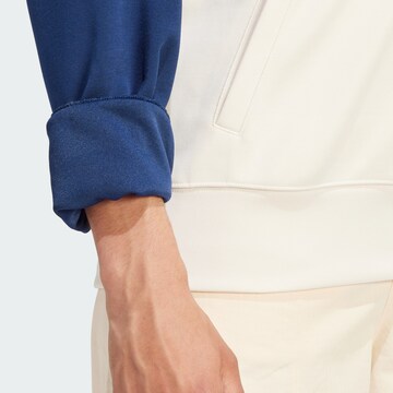 Sweat-shirt 'Cutline' ADIDAS ORIGINALS en bleu