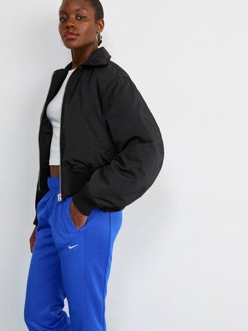 Nike Sportswear Flared Trousers in Blue
