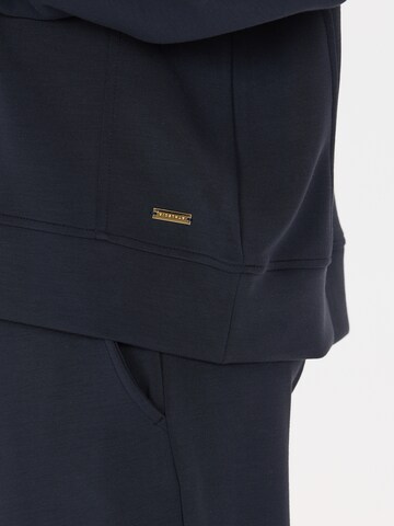 Athlecia Sportief sweatshirt 'Jacey' in Blauw