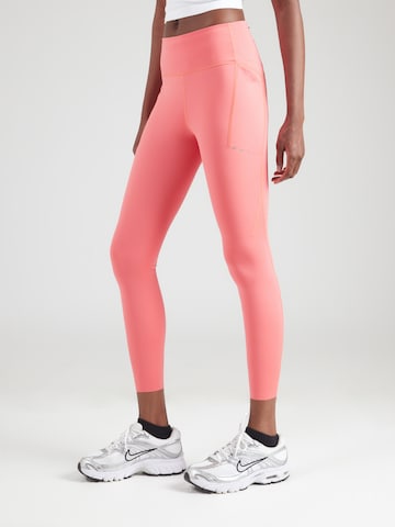 NIKE Kitsas Spordipüksid 'SWIFT', värv oranž: eest vaates