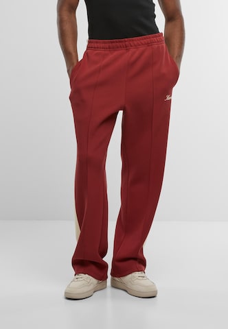 Karl Kani Regular Pants in Red: front