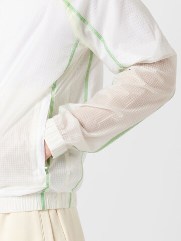 Lacoste Sport - Chaqueta deportiva en blanco