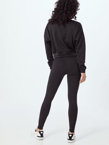 PUMA Skinny Sporthose in Schwarz
